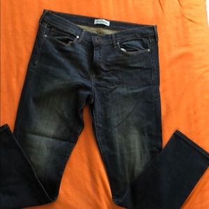 Skinny washed dark blue jeans